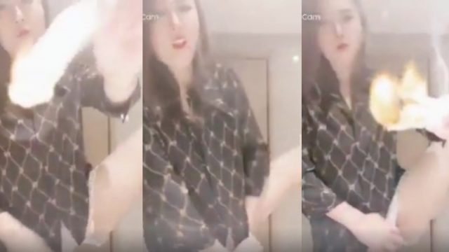 短褲女自拍著火紙張塞落下體